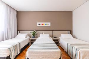 Cama ou camas em um quarto em Viale Cataratas Hotel & Eventos