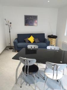 Χώρος καθιστικού στο L'appartement de la grange
