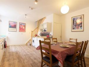 a kitchen and dining room with a table and chairs at Greencroft View, SALISBURY in Salisbury