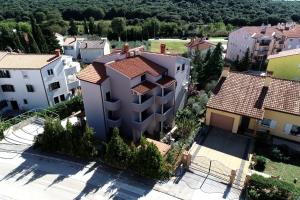an overhead view of a building in a village at Vratovic Apartments in Pula