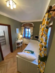 Postelja oz. postelje v sobi nastanitve Boutique Hotel Romantick