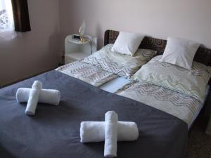 Postel nebo postele na pokoji v ubytování Keresztapa Vendégház