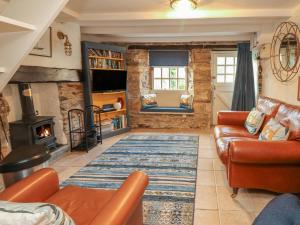 Posezení v ubytování May Cottage + 14 fotografií