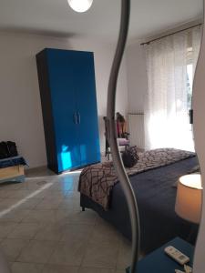 Кровать или кровати в номере "I Cutulisci" Apartment