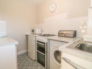 Kuchyň nebo kuchyňský kout v ubytování Holly Cottage + 4 fotografie