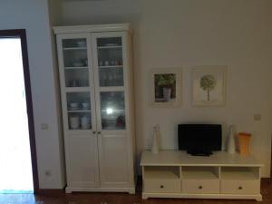 TV a/nebo společenská místnost v ubytování Casa Tequila