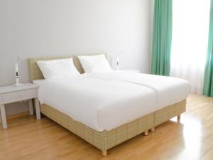 Postel nebo postele na pokoji v ubytování Apartments SNEZKA LUXE