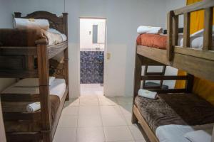Postel nebo postele na pokoji v ubytování Ulucaho Hostel