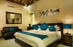 Cama o camas de una habitación en My Villas In Bali