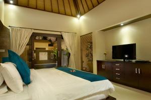 Cama o camas de una habitación en My Villas In Bali
