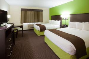 Katil atau katil-katil dalam bilik di AmericInn by Wyndham Crookston U of M Crookston