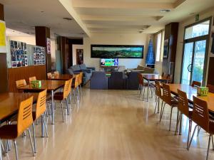 TV a/nebo společenská místnost v ubytování Hotel Berga Park