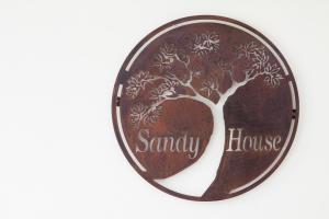 Certifikát, hodnocení, plakát nebo jiný dokument vystavený v ubytování Sandy House Rawai