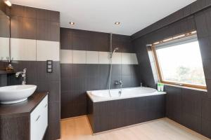 Ванная комната в Duplex appertement met zicht Damse vaart @ Brugge
