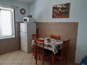 Kuchyň nebo kuchyňský kout v ubytování Apartments Jurkovic
