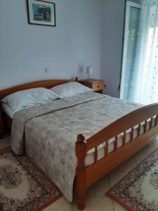 Postel nebo postele na pokoji v ubytování Apartments Jurkovic