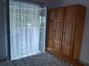 Postel nebo postele na pokoji v ubytování Apartments Jurkovic