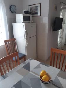 Kuchyň nebo kuchyňský kout v ubytování Apartments Jurkovic