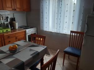 Kuchyň nebo kuchyňský kout v ubytování Apartments Jurkovic