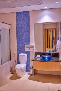 Kylpyhuone majoituspaikassa City Stay Grand Hotel Apartments - Al Barsha