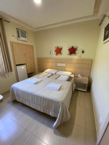 Postel nebo postele na pokoji v ubytování Palace Hotel
