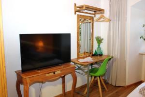 TV a/nebo společenská místnost v ubytování Ultra Alpes Luitpold