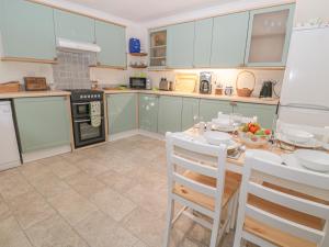 Køkken eller tekøkken på Wordsworth Cottage West