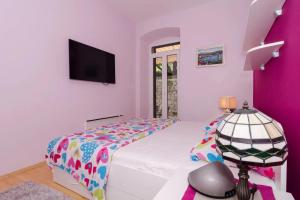 Postel nebo postele na pokoji v ubytování Apartment Djivo