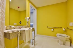 Um banheiro em Nobile Inn Pampulha