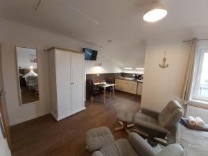 Kuchyň nebo kuchyňský kout v ubytování Appartment Vermietung Lütje