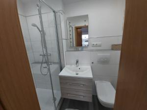 Koupelna v ubytování Appartment Vermietung Lütje
