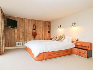 Кровать или кровати в номере Butlers Lodge