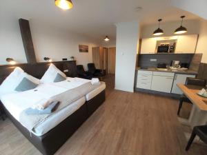 Kuchyň nebo kuchyňský kout v ubytování Appartment Vermietung Lütje