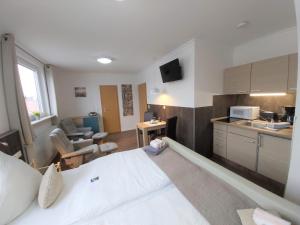 Kuchyň nebo kuchyňský kout v ubytování Appartment Vermietung Lütje