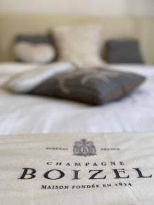 A bed or beds in a room at Feltre House