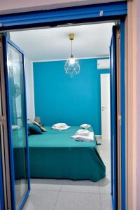 Postel nebo postele na pokoji v ubytování Scala dei Turchi Luxury Home