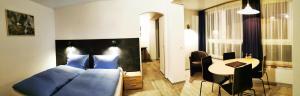 Svetainės erdvė apgyvendinimo įstaigoje Hotel Alpha