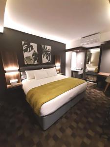 Katil atau katil-katil dalam bilik di Copperwood Hotel and Conferencing