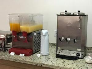 Příslušenství pro přípravu čaje a kávy v ubytování Hotel Infinity