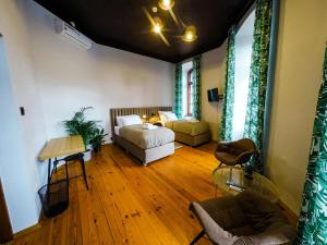Posteľ alebo postele v izbe v ubytovaní Apartamenty w Wieży