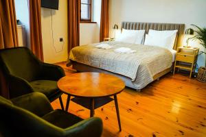 Posteľ alebo postele v izbe v ubytovaní Apartamenty w Wieży