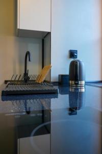 Kuchyňa alebo kuchynka v ubytovaní Apartamenty w Wieży
