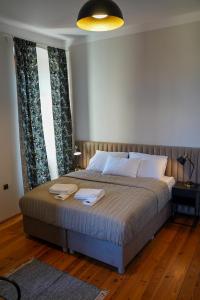 Posteľ alebo postele v izbe v ubytovaní Apartamenty w Wieży