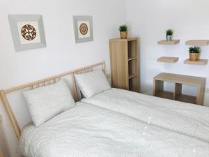 Posteľ alebo postele v izbe v ubytovaní Casa Pura Vida Guardamar del Segura