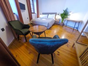 Posteľ alebo postele v izbe v ubytovaní Apartamenty w Wieży