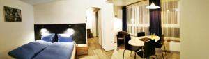 Svetainės erdvė apgyvendinimo įstaigoje Hotel Alpha