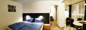 Svetainės erdvė apgyvendinimo įstaigoje Hotel Alpha