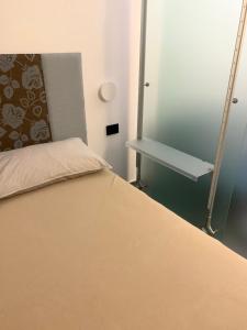 A bed or beds in a room at P. ROOM