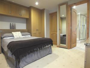 Postel nebo postele na pokoji v ubytování Cable Cottage