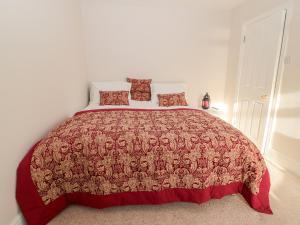 Llit o llits en una habitació de Tynemouth Village Penthouse